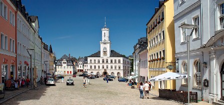  André Karwath aka [a]https://commons.wikimedia.org/wiki/User:Aka[/a][n]Aka[/n], [a]https://commons.wikimedia.org/wiki/File:Schneeberg_marketplace_with_townhall_(aka).jpg[/a][n]Schneeberg marketplace with townhall (aka)[/n], [a]https://creativecommons.org/licenses/by-sa/2.5/legalcode[/a][n]CC BY-SA 2.5[/n] 
